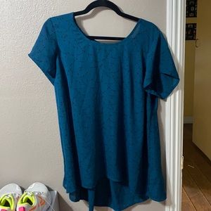 Turquoise blouse with black star design